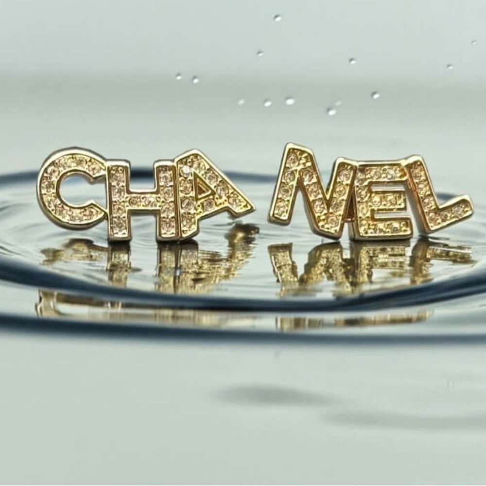 Gold Crystal 'CHA' & 'NEL' Logo Post Earrings